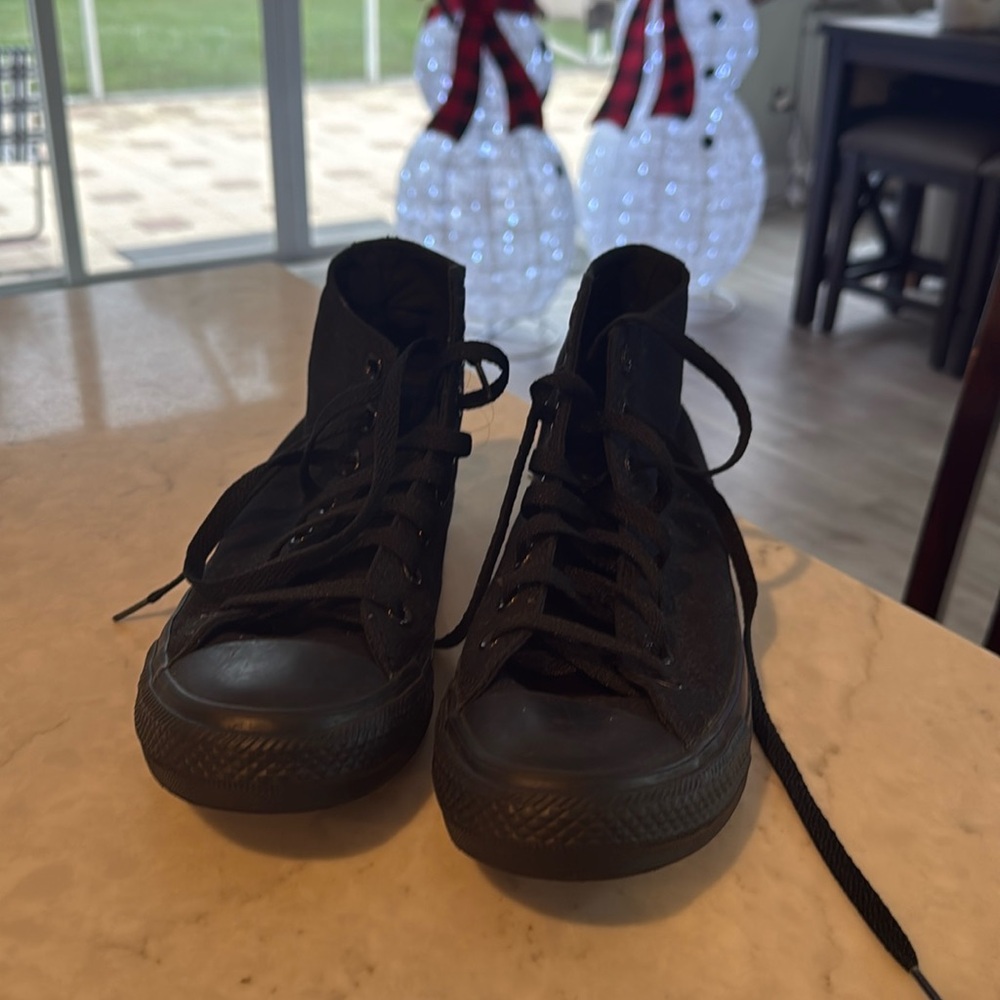 Gently used black monochrome high top converse 💫